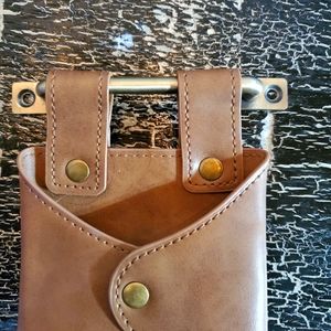 Cell phone holder mount for wall